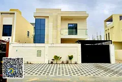 For sale in Al Helio 2, Ajman: a 5-bedroom villa, including registration fees,freehold