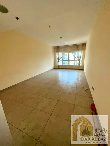 Two-bedroom apartment with a living room for annual rent in Al-Taawon Street, Al-Bana'a, directly on the lake. Two bedrooms plus a maid's room, parkin