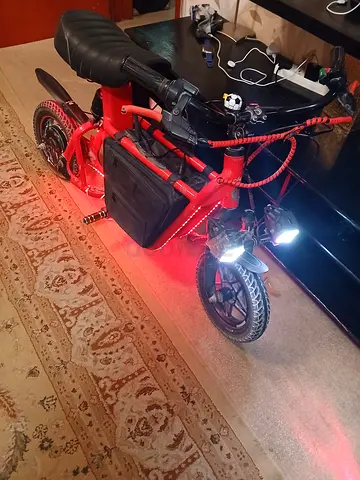 Red electric scooter / mini e-bike with lights — good working condition