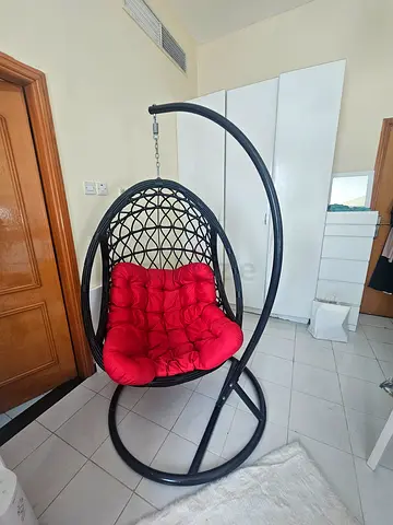 Beautiful hanging Egg Chair with red cushion - excellent condition. Really comfortable.