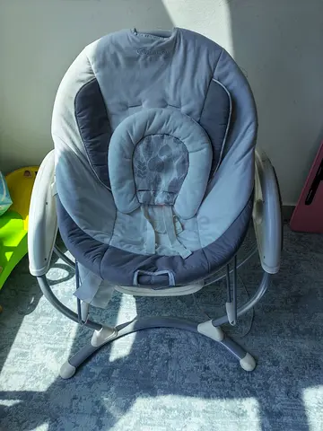 Gently used baby rocker/swing in grey — comfortable infant seat