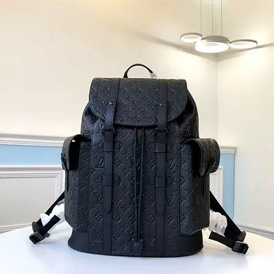 Louis Vuitton Christopher MM Backpack in Taurillon Cowhide Leather With Embossed Monogram Motif