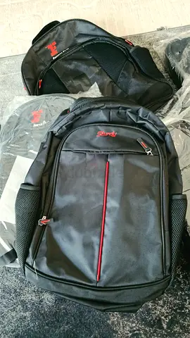 Black travel backpack with red trim - good used condition
