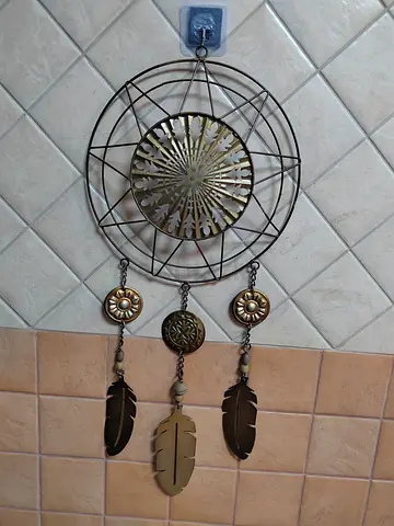 Metal dreamcatcher wall hanging with feather charms - decorative piece