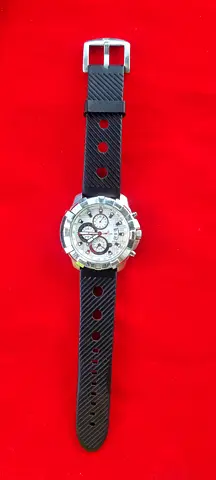 Mens silver chronograph watch with black rubber strap