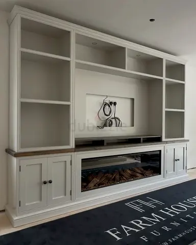 Large White Farmhouse Entertainment Unit and open cabinets