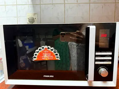 White countertop microwave oven - used, good working condition
