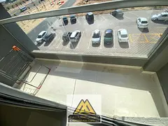 Two-bedroom apartment with a living room and balcony with a view in Al Jurf 3 area, close to the Chi