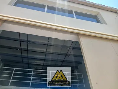 Warehouse for rent in Al Jurf Industrial Area 1, suitable for various commercial and industrial activities, close to services and main roads.