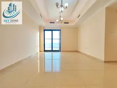 LIKE NEW ULTRA LUXURIOUS AND SPACIOUS 2 BEDROOM WITH CLOSED KITCHEN HAVING GYM AND PARKING. .