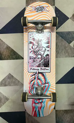 Used colorful skateboard deck with graphic design