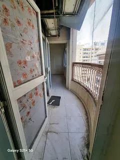For rent in Al Qasimia (Station), Sharjah: 2-bedroom apartment, 2 bathrooms, large balcony, central