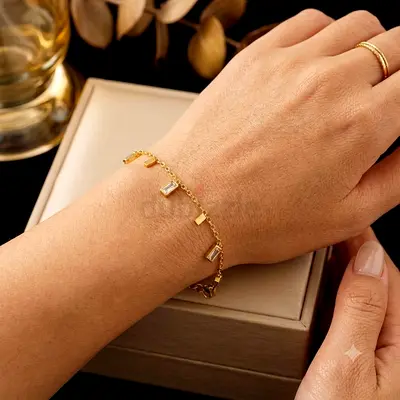 Delicate Gold Bracelet with Baguette Cubic Zirconia Charms