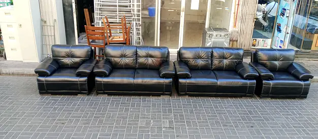 Black Leather 4-Piece Sofa Set — 3-Seat + 2-Seat + 2 Armchairs
