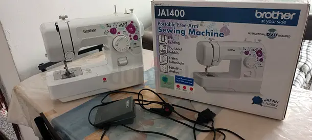 Brother JA1400 Portable Free-Arm Sewing Machine with Foot Pedal and Box