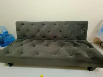 Grey tufted sofa bed / futon - compact 2-seater