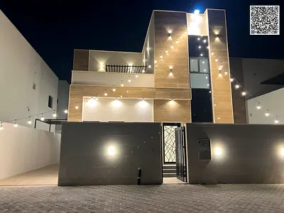 Own your dream villa now at a price that includes registration and ownership fees in Al Helio 2, Ajman (two floors + roof). Prime location opposite th
