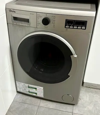 Silver front-load washing machine - working condition