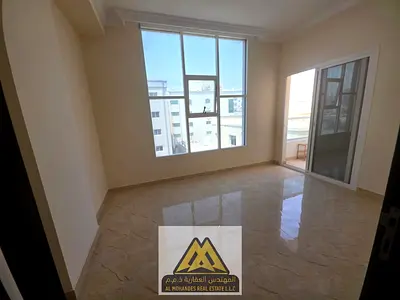 A well-designed 2-bedroom apartment is available for annual rent in Al Nuaimiya 1, Ajman, next to Zone Fashion. The apartment features a practical lay