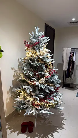 Flocked Christmas Tree with Gold and Red Decorations
