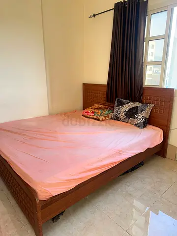 Wooden double bed with headboard - good condition