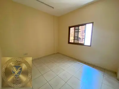 One bedroom apartment with a living room for annual rent in Al Bu Tina Spacious layout Modern finis