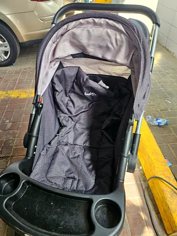 Gray baby stroller (single) with canopy and tray - good condition
