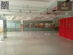 Massive 10,500 Sq. Ft. Commercial Showroom for Rent | Prime Main Road | Al Rashidiya 2 | High Visibi