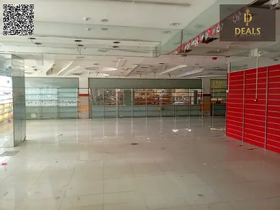 Massive 10,500 Sq. Ft. Commercial Showroom for Rent | Prime Main Road | Al Rashidiya 2 | High Visibility