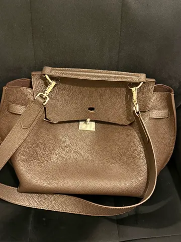 Brown leather shoulder bag with adjustable strap — gently used