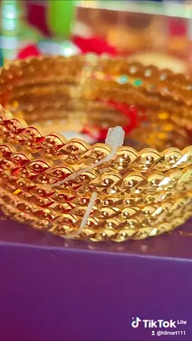 Set of Gold Toned Bangles with Intricate Design