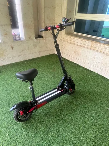 Electric Scooter with Seat — Good Condition, Ready to Ride