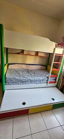 Wooden kids bunk bed with trundle and shelves - good used condition