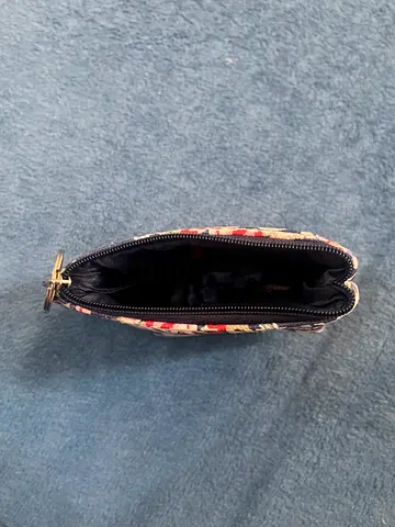 Small floral zip pouch it is from Japan