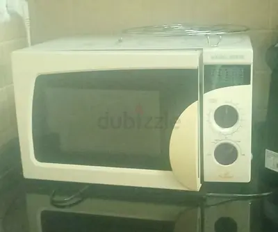 Used Black  Decker Countertop Microwave Oven - Good Working Condition