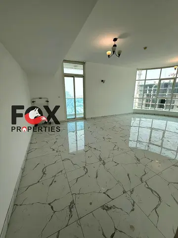 🚀🔥 فرصة ذهبية بسعر مميز جداً! شقة غرفتين وصالة مع باركينج مجاني و3 بلكونات في أبراج الواحة - عجمان 🔥🚀