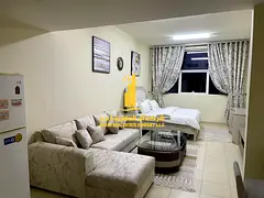Furnished semi-detached kitchen studio with very high-end furniture for monthly rent in Ajman - Al R