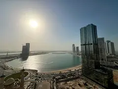 Stunning 2BR + Hall in Al Mamzar: Direct Sea View, Free AC, Gym, Pool & Parking