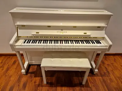 White upright Steinberg piano HU-110 with matching bench