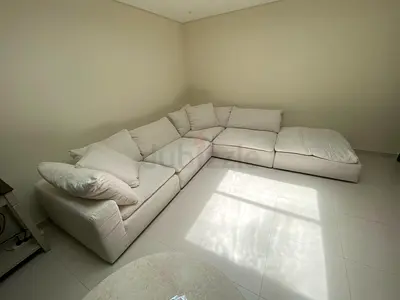 Timothy Oulton modular sofa with footstool