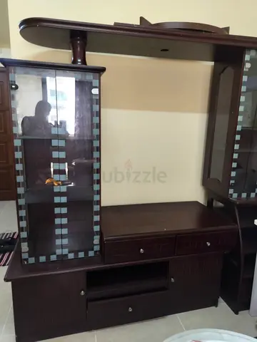 Dark wood entertainment TV unit with glass display cabinets
