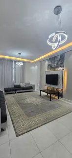 For sale: Super deluxe two-bedroom apartment with living room, fully furnished, on Sheikh Khalifa Bi