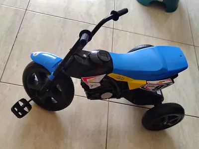 Blue toddler tricycle with pedals - good used condition