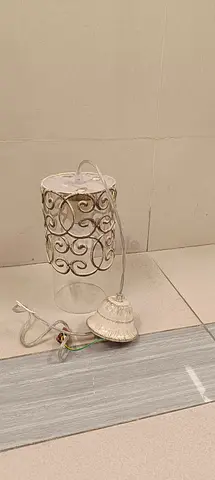 White decorative hanging pendant light with scroll metal shade