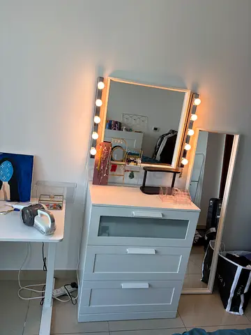 Bedroom dresser with mirror and lights