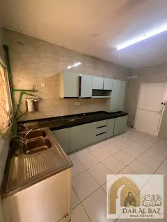 Villa for annual rent in Al Jazat area, consisting of 4 bedrooms, 4 bathrooms, spacious area, four p
