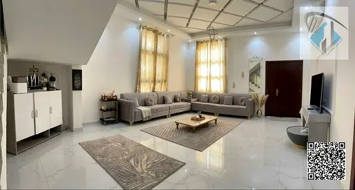 Villa for sale in Al Yasmin area, Ajman, including electricity, water, and air conditioning.