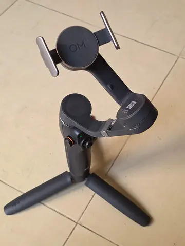 Used DJI OM6 - 4-axis Smartphone Gimbal with Tripod - Good Condition