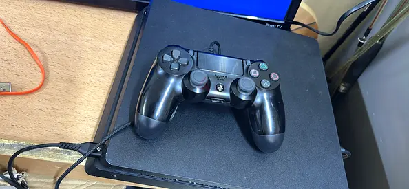 Used Sony PlayStation 4 Slim with DualShock 4 Controller - Working