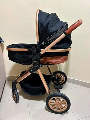 Rose Gold and Black Baby Stroller with Carrycot